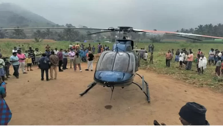 சத்தியமங்கலம் அருகே திடீர் என வயல்வெளியில் இறங்கிய ஹெலிகாப்டர்